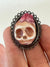 Small pink skull resin ring